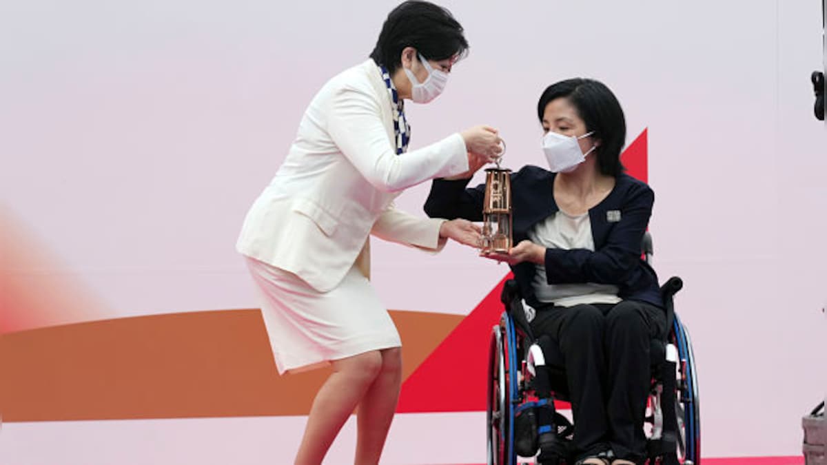 Tokyo Olympics 2020: Olympic flame arrives in city with low-key ceremony and no spectators