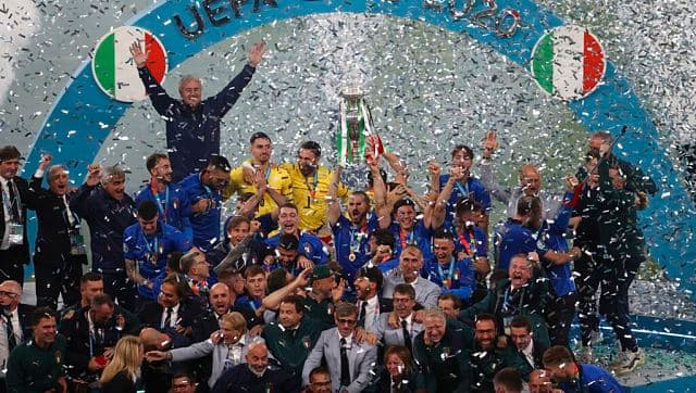 Italian team celebrates with the trophy after the Euro 2020 final between England and Italy. AP