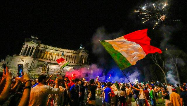 Italy’s fans celebrate in Rome, Monday, 12 July, 2021. This is Italy’s second title win. AP