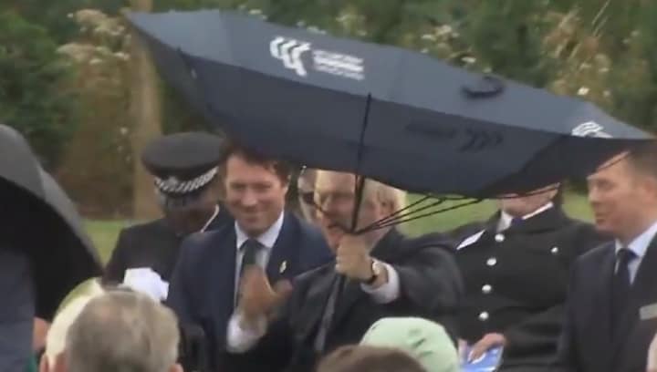 Watch: Boris Johnson struggles with umbrella at memorial service for police; viral video prompts memes aplenty