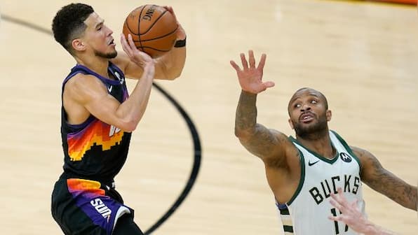 NBA Finals: Devin Booker stars as Phoenix Suns beat Milwaukee Bucks to seize 2-0 lead