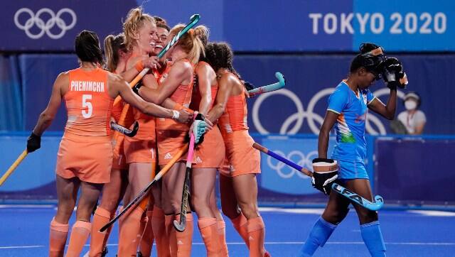 The Netherlands women's hockey team celebrate a goal during their Pool A clash against India. AP