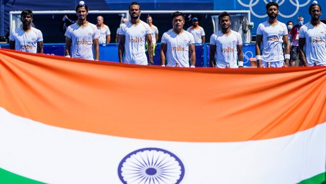 The India men's hockey team during the national anthem ahead of their Pool A game against New Zealand. AP