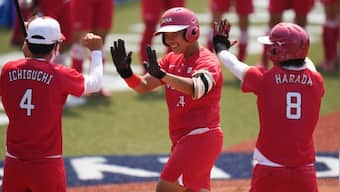 Tokyo Olympics 2020: Japan top Australia in softball as delayed Summer Games open