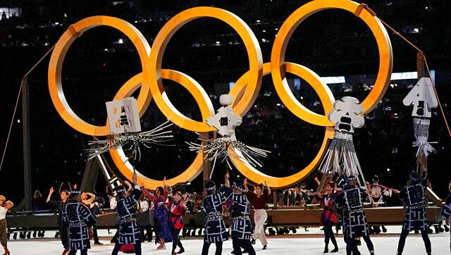 A group of dancers perform at the start of the Olympics opening ceremony. AP 