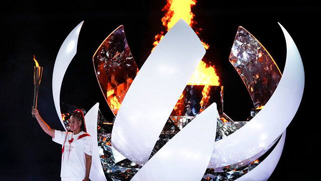 Japanese tennis star Naomi Osaka after lighting the Olympic Cauldron flame to officially mark the start of the Olympic Games. AP 