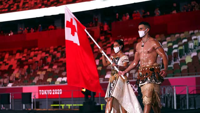 Malia Paseka and Pita Taufatofua, flag-bearers of Tonga at the Olympics opening ceremony. Pita will bee taking part in Taekwondo, hoping to earn just his country’s second-all time medal at the Games. AP 
