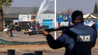 At least 10 killed in South Africa over riots triggered by jailing of former president Jacob Zuma