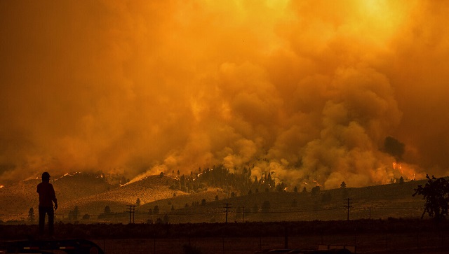 Fires rage in several states as heat wave broils US West, strains power grids Fires rage in several states as heat wave broils US West, strains power grids