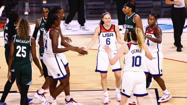 United States guards Sue Bird (6) and Jewell Loyd (4) gather with teammates during a break while playing Nigeria in the first half of a pre-Olympic exhibition basketball game in Las Vegas on Sunday, July 18, 2021. (Chase Stevens/Las Vegas Review-Journal via AP)