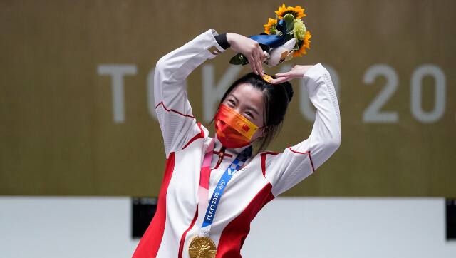 China's Yang Qiang won the women's 10m air rifle event to become the first gold medallist of the 2020 Tokyo Olympics. AP