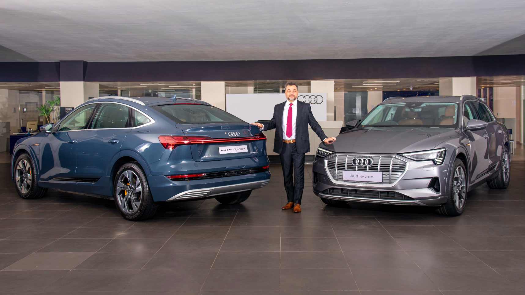 The Audi e-tron Sportback (left) costs roughly Rs 1.5 lakh more than the standard e-tron 55. Image: Audi India