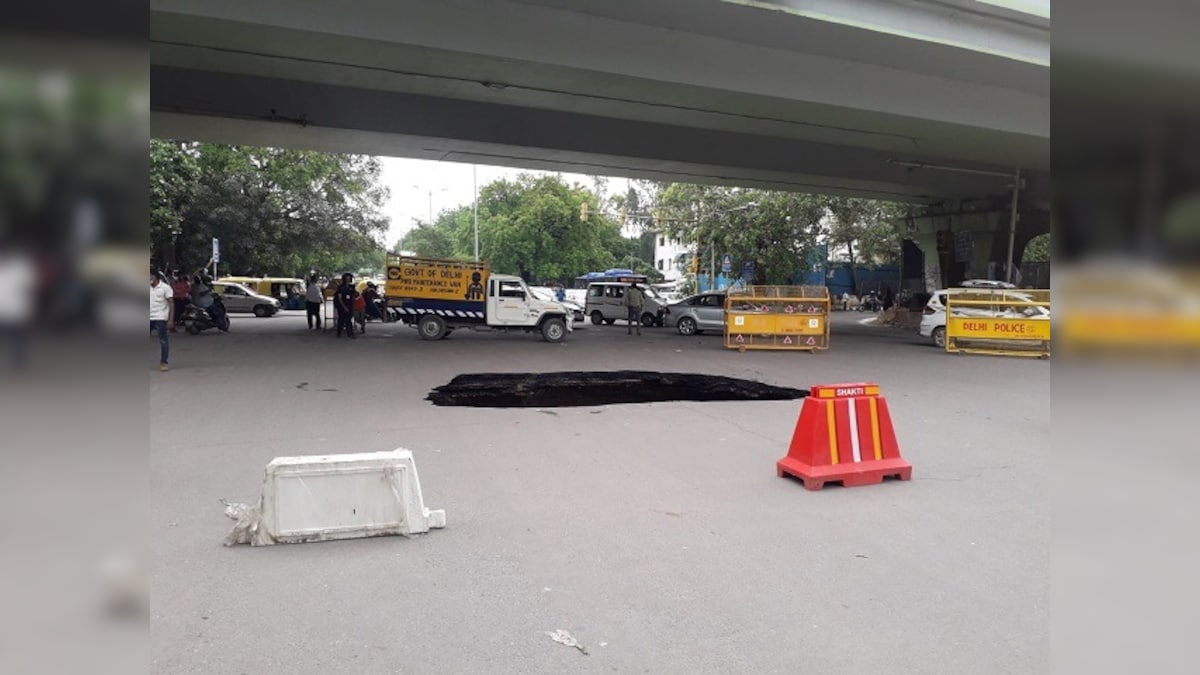 Portion of road under IIT-Delhi flyover caves in after heavy rains; traffic diverted