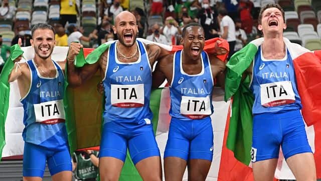 Italy’s (from left) Lorenzo Patta, Lamont Marcell Jacobs, Eseosa Desalu and Filippo Tortu celebrate at the end of the men’s 4x100m relay final. AFP
