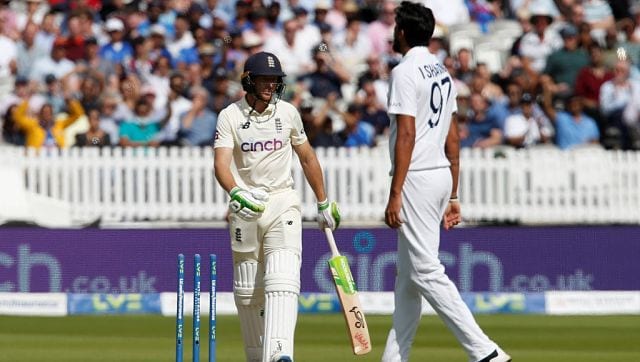 India’s Ishant Sharma (right) celebrates taking the wicket of England’s Jos Buttler. AFP