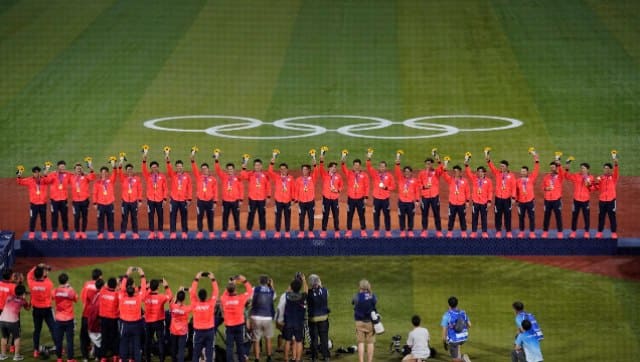 Japan men's baseball team are crowned gold medallists after their victory over the United States in the final. AP