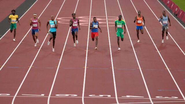 Bahamas' Steven Gardiner races ahead of Colombia's Anthony Zambrano and Grenada's Kirani James to win the men's 400m final. AP