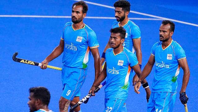 India’s Vivek Sagar Prasad (32) alongside his teammates during a men’s field hockey match against Australia. AP