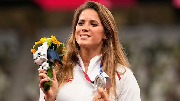 Polish javelin thrower raises money for sick child by auctioning off Olympics silver medal; buyer tells her to keep it