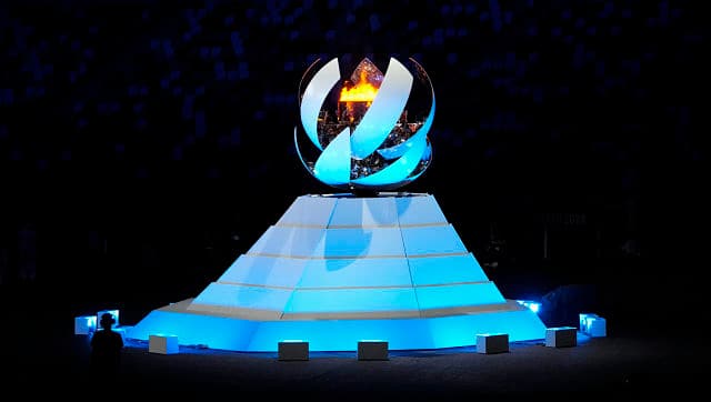 The Olympic flame is extinguished during the closing ceremony in the Olympic Stadium at the 2020 Summer Olympics. AP/Aaron Favila