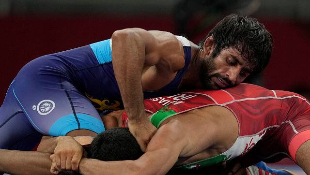 Meanwhile, wrestler Bajrang Punia lost his semi-final bout to Azerbaijan’s Haji Aliyev in the men’s 65 kg freestyle semi-finals. He remains in contention for a bronze. Here, he is seen fighting Iran’s Morteza Ghiasi in his campaign opener on Friday. AP  