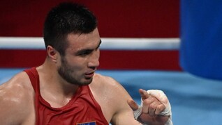 Mourad Aliev of Team France reacts after losing by