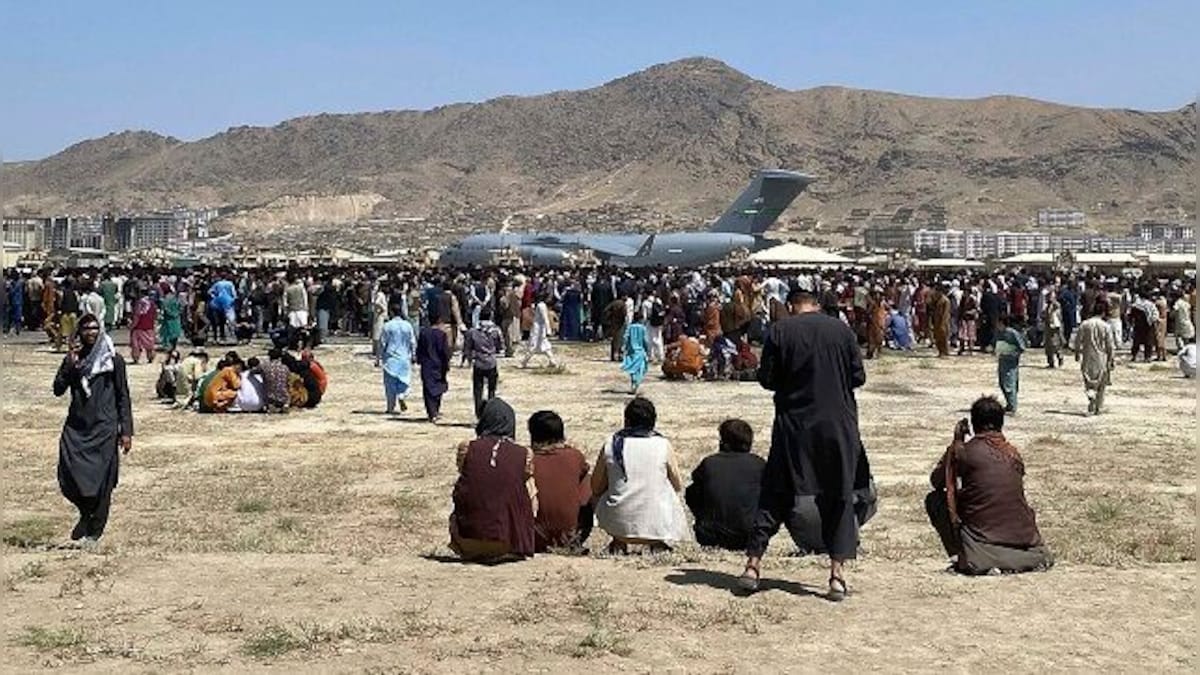 At least seven Afghans killed in chaos near Kabul airport, says UK defence ministry