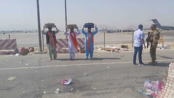 On board India's Kabul  evacuation flight, 46 Afghan  Sikhs, Hindus — and 3 copies of Guru Granth Sahib