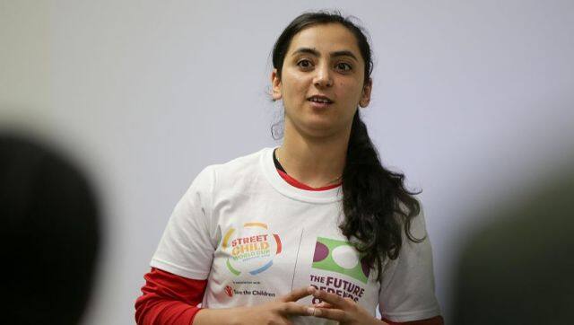 Former Afghanistan women’s football captain Khalida Popal speaks during a motivational session with young women in south London on March 30, 2018. - Former Afghanistan women’s football captain Khalida Popal fled her country after receiving death threats but it has far from cowed her in fighting the prejudice which confronts women daily, she told AFP. The 30-year-old – who has been based in Denmark since 2011 – takes her message round the world and spoke after giving an inspirational talk to the girls of Team England who will compete in the Street Child World Cup in Moscow later this year. Popal said women could achieve anything, a belief she formed when as a child a group of men refused to give back the football she was playing with, saying girls had no right to take part in sport. (Photo by Daniel LEAL-OLIVAS / AFP)