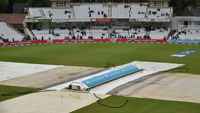 The pitch at Nottingham’s Trent Bridge is seen covered on Sunday. Day five of the first Test between England and India was washed out due to rain, meaning the match ended in a draw. India’s score remained 52-1 while chasing a target of 209. AP 