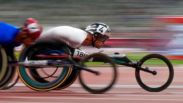 Switzerland's Marcel Hug, competes in the men's T54 5000-meters final during the 2020 Paralympics at the National Stadium in Tokyo. AP Photo