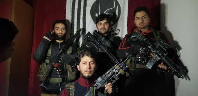 (LEFT) Sameer Dar, his cousin and Pulwama suicide bomber Adil Dar, Muhammad Umar Farooq; foreground, kneeling, Muhammad Ismail Alvi