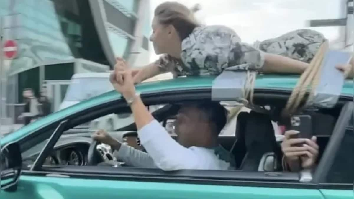 Watch: Russian influencer drives with girlfriend tied to roof in bizarre 'trust test'; police launches probe