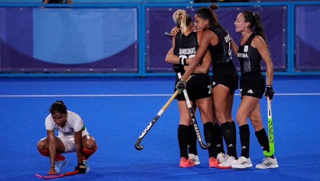 A disappointed Vandana Katariya as Argentina payers celebrate the semi-finals win. AP