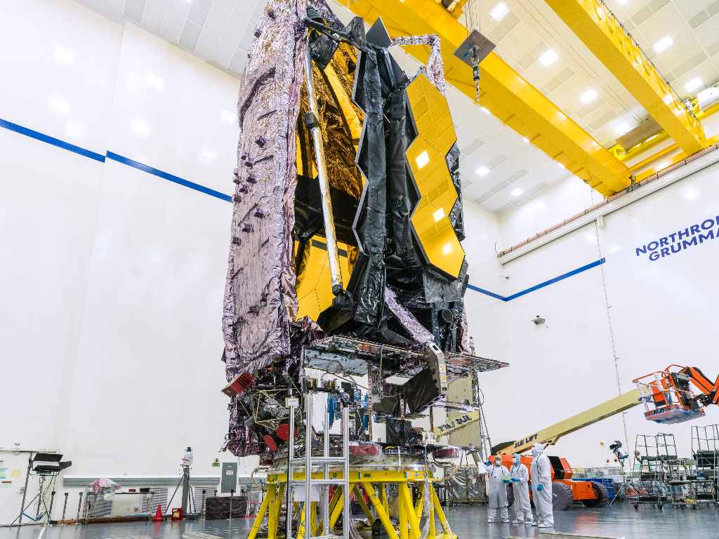 Fully assembled and fully tested, the NASA/ESA/CSA James Webb Space Telescope has completed its primary testing regimen and is soon preparing for shipment to its launch site at Europe’s Spaceport in French Guiana. On this photo, Webb is folded as it will be for launch. Image credit: NASA/Chris Gunn