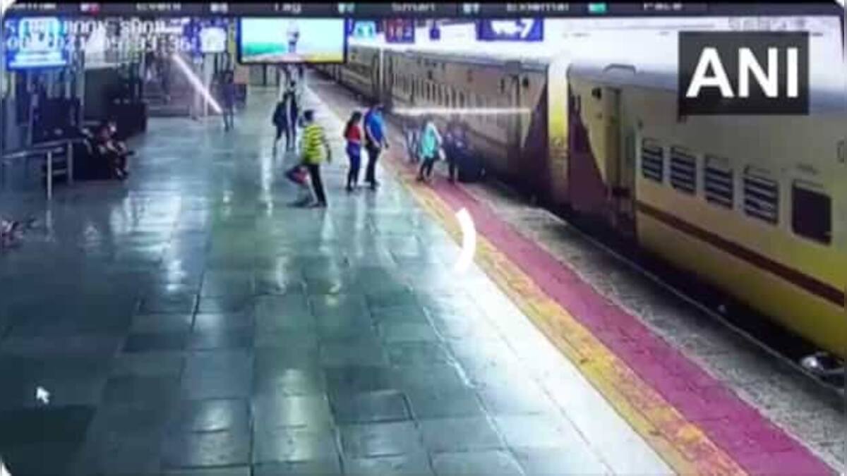 Watch video: Woman trying to board moving train falls, rescued by co ...