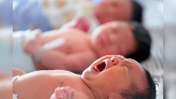 China approves three-child policy as population growth slows, offers sops to reluctant parents