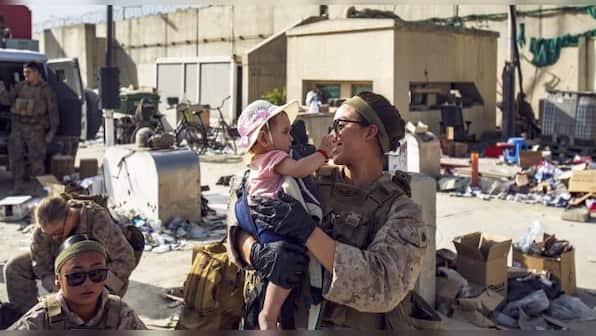 Afghan family names baby girl 'Reach' after she is born on evacuation flight from Kabul to Germany