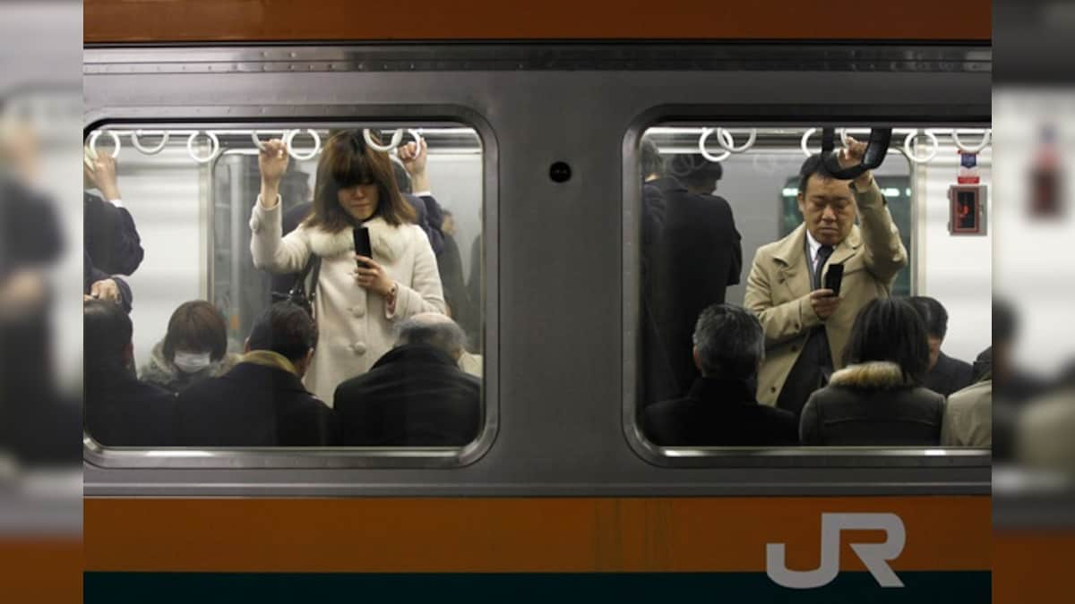 Man who stabbed at least 10 people on Tokyo train for 'looking happy' arrested