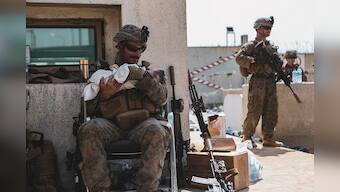 Picture of US Marine calming Afghan baby during Kabul evacuation goes viral; see image here
