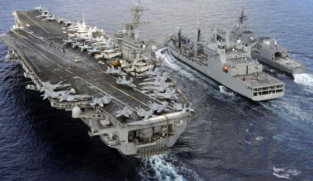 The USS Theodore Roosevelt and Japanese Maritime Self-defense Force Akizuki-class destroyer JS Fuyuzuki sail alongside the Indian Deepak-class fleet tanker INS Shakti during the Malabar naval exercise. AFP Photo