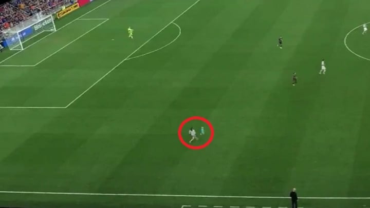 Watch: Two-year-old kid runs onto soccer pitch during match, mom tackles him in seconds