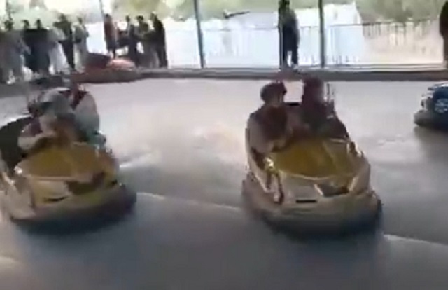 When the Taliban come to town: Kalashnikovs in hand, fighters check out presidential gym, enjoy rides at Kabul amusement park When the Taliban come to town: Kalashnikovs in hand, fighters check out presidential gym, enjoy rides at Kabul amusement park