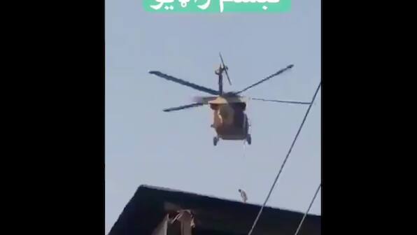 After US exit, Taliban fly American chopper with body hanging from rope; see video here