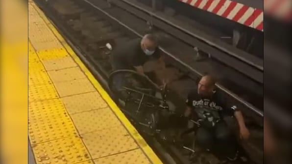 Not all heroes wear capes: Man rescues wheelchair-bound commuter who fell on tracks, minutes before train arrives