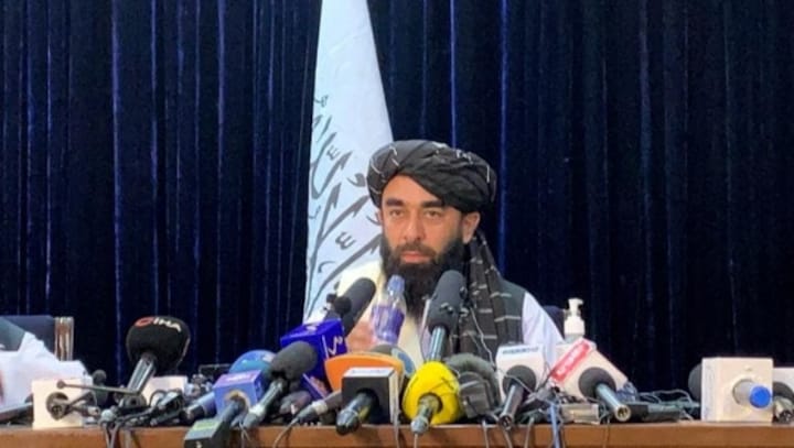 Afghanistan women to have rights 'within Islamic law', says Taliban in first press conference since taking over country