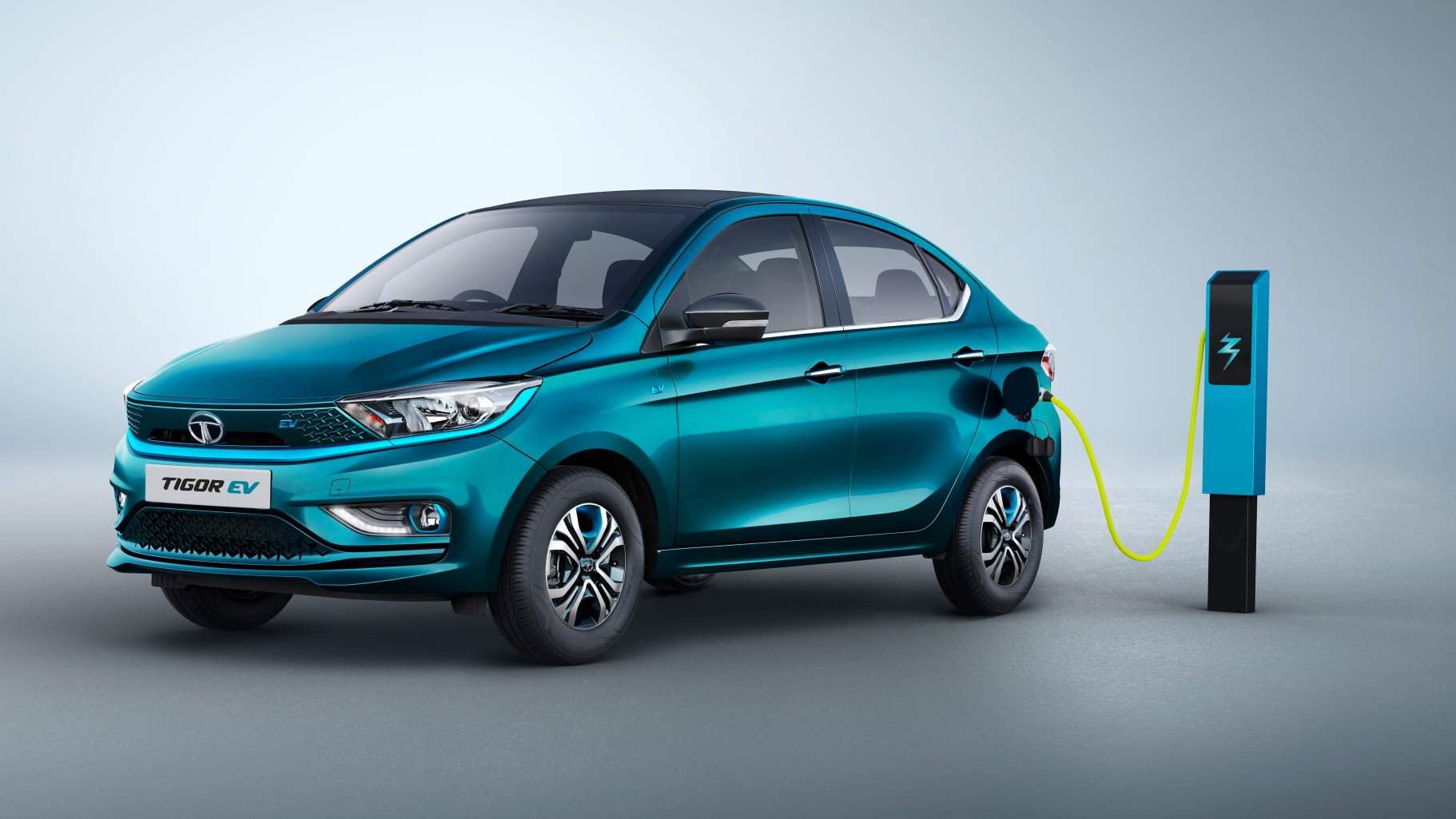 Tata Tigor EV Ziptron reveal highlights: Revamped compact electric sedan features 26 kWh battery, bookings open Tata Tigor EV Ziptron reveal highlights: Revamped compact electric sedan features 26 kWh battery, bookings open