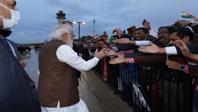 Modi received a warm welcome from the members of the Indian community at Joint Base Andrews in Washington DC. He stepped out of his motorcade to interact with the Indians waiting at the airport. The crowd was chanting his name and waving the Indian flag amid light showers. The prime minister was seen smiling and shaking handing with the members of the Indian community. Image Courtesy: @narendramodi/Twitter