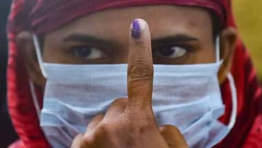 People brave floods, COVID-19 to cast their votes in Bhabanipur bypoll