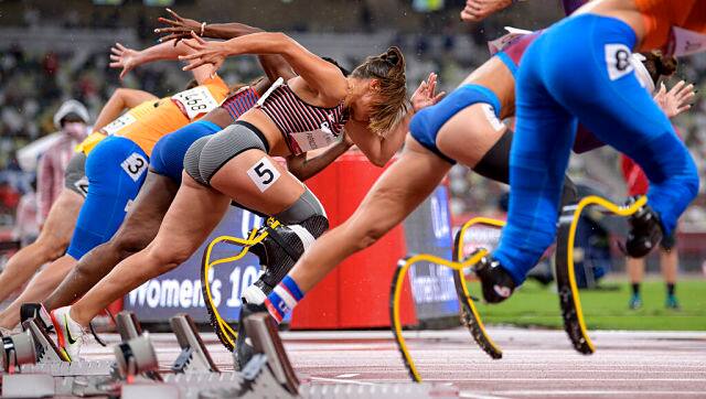 Marissa Papaconstantinou of Canada (in focus) sets off from the blocks at the start of the Athletics Women's 100m - T64 Round 1 - Heat 2 Final at the Olympic Stadium during the Tokyo 2020 Paralympic Games on Thursday. AP Photo